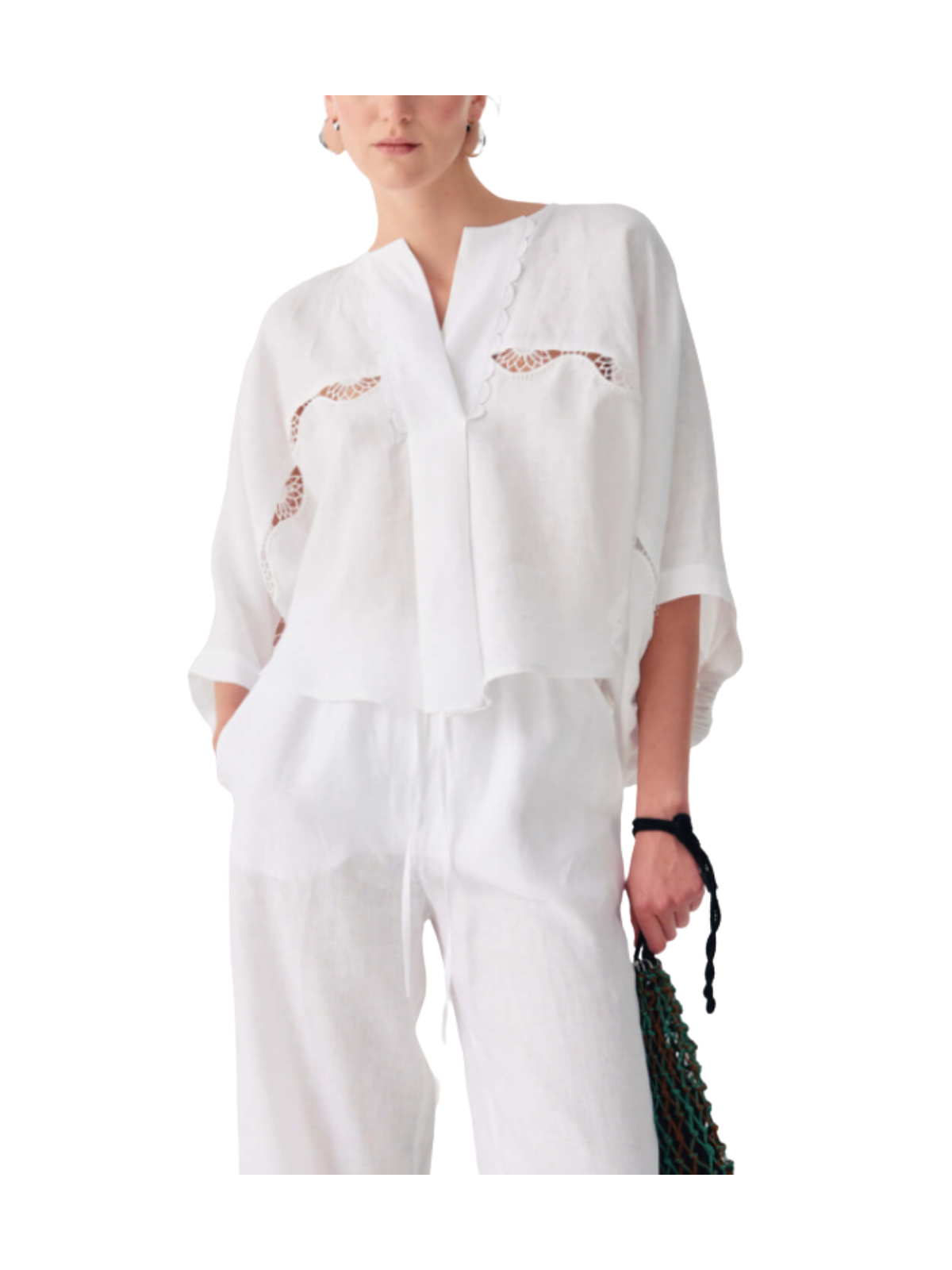 Blusa in lino con pizzi