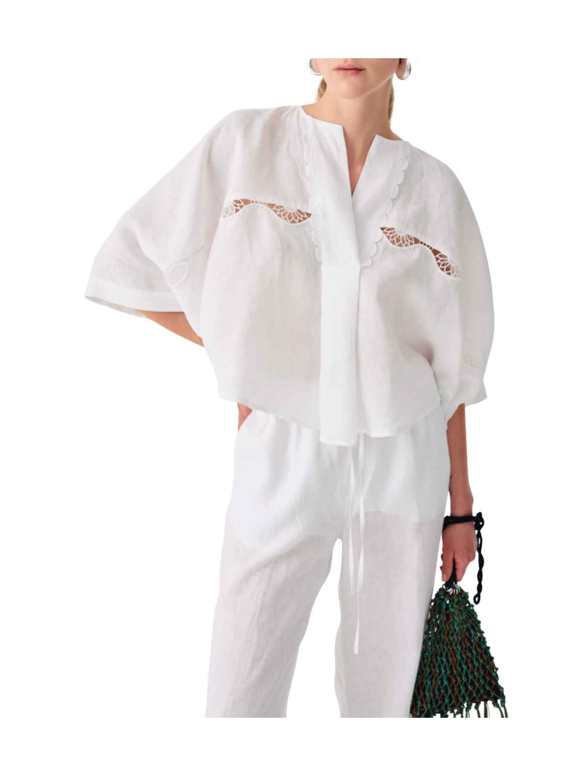 Blusa in lino con pizzi